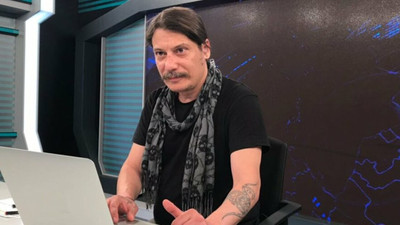 Gazeteci Erk Acarer'in evine tehdit mesajı bırakıldı