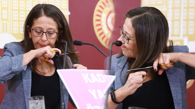 HDP'li Ersoy, İranlı kadınlara destek için saçını kesti