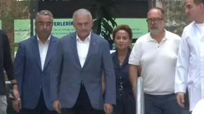 Binali Yıldırım kaza geçiren Sabancı çiftini ziyaret etti