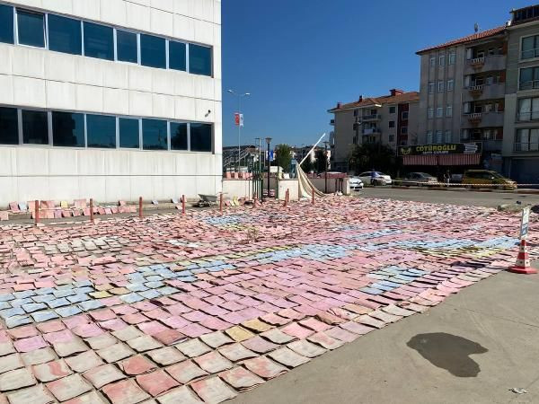 Selde ıslanan SGK arşivi güneşli günlerde bahçede kurutuluyor - Sayfa 1