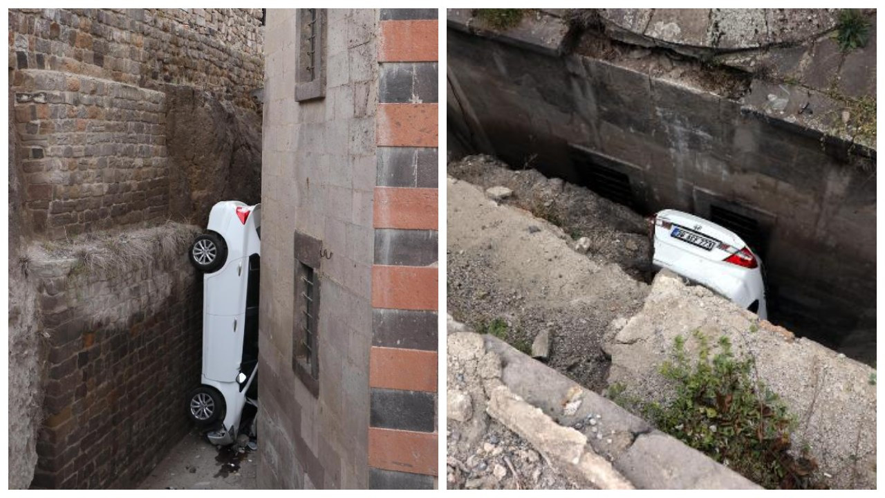 5 metreden düşen otomobil, 2 duvar arasına sıkıştı